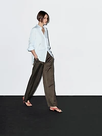 Wide-leg satin trousers with creased effect