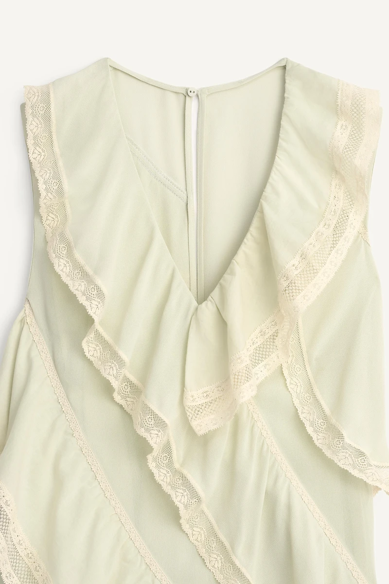 ROBE À VOLANTS ET DENTELLE LIMITED EDITION