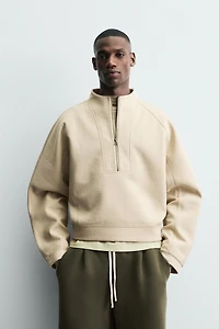 CROPPED FIT NEOPRENE EFFECT SWEATSHIRT WITH STUDS