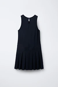 ROBE-SALOPETTE PLIS PLATS