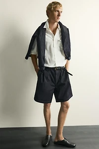 RELAXED FIT PLEATED CHINO DENIM SHORTS
