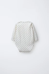 FIVE-PACK OF FLORAL BODYSUITS