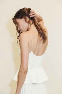 STRETCH PEPLUM TOP