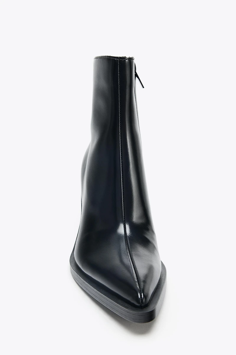 COWBOY HEELED ANKLE BOOTS