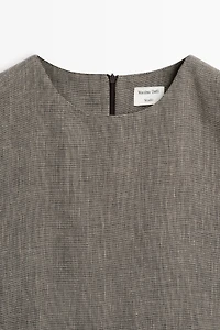 STUDIO textured top with cut-out details