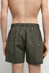 Striped print swimming trunks
