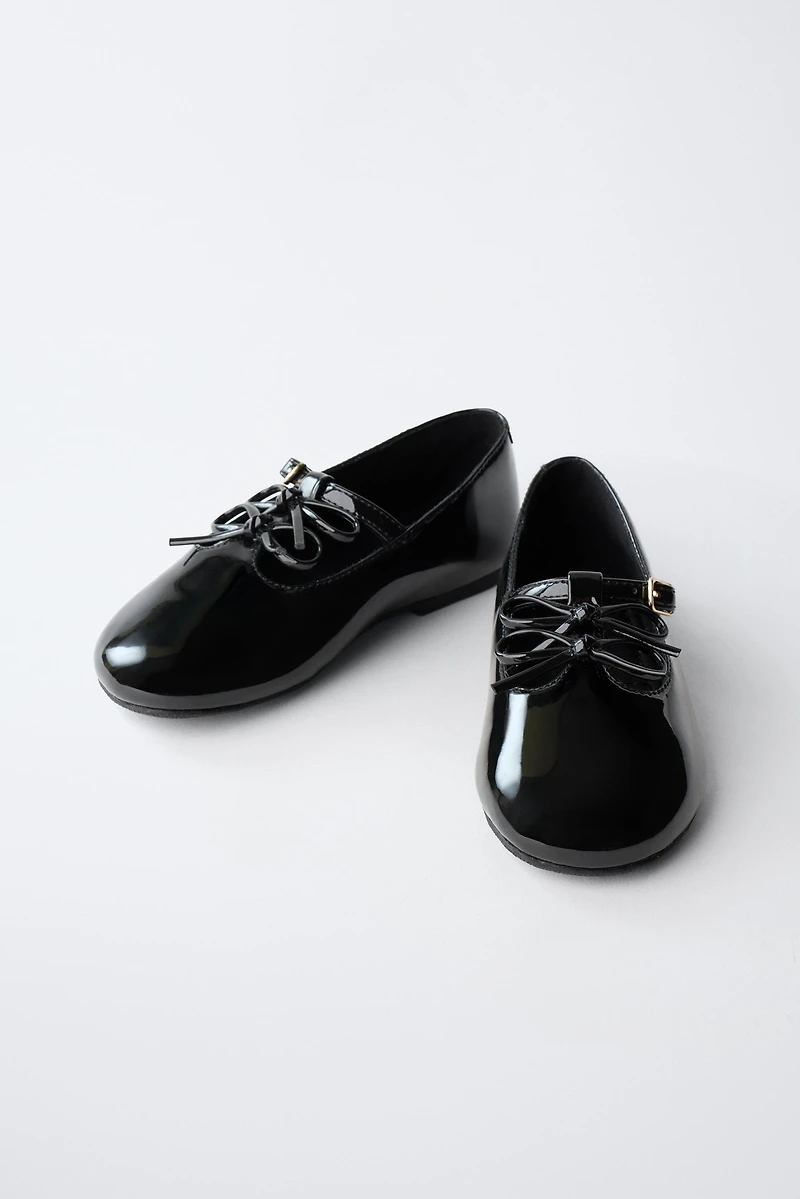PATENT LEATHER BALLET FLATS WITH BOWS
