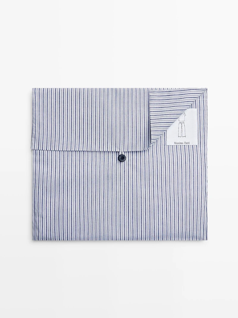 Short sleeve pyjama top and striped trousers
