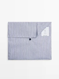 Short sleeve pyjama top and striped trousers