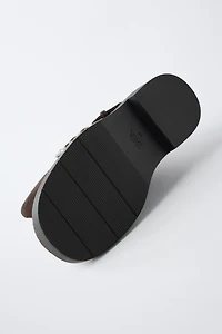 BUCKLED LEATHER BOOTS