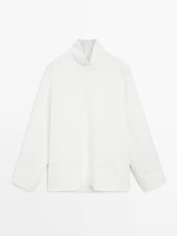 High neck blouse with hem detail