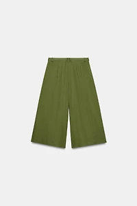 BEADED BELT LONG SHORTS
