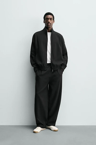 INTERLOCK ZIP SWEATSHIRT