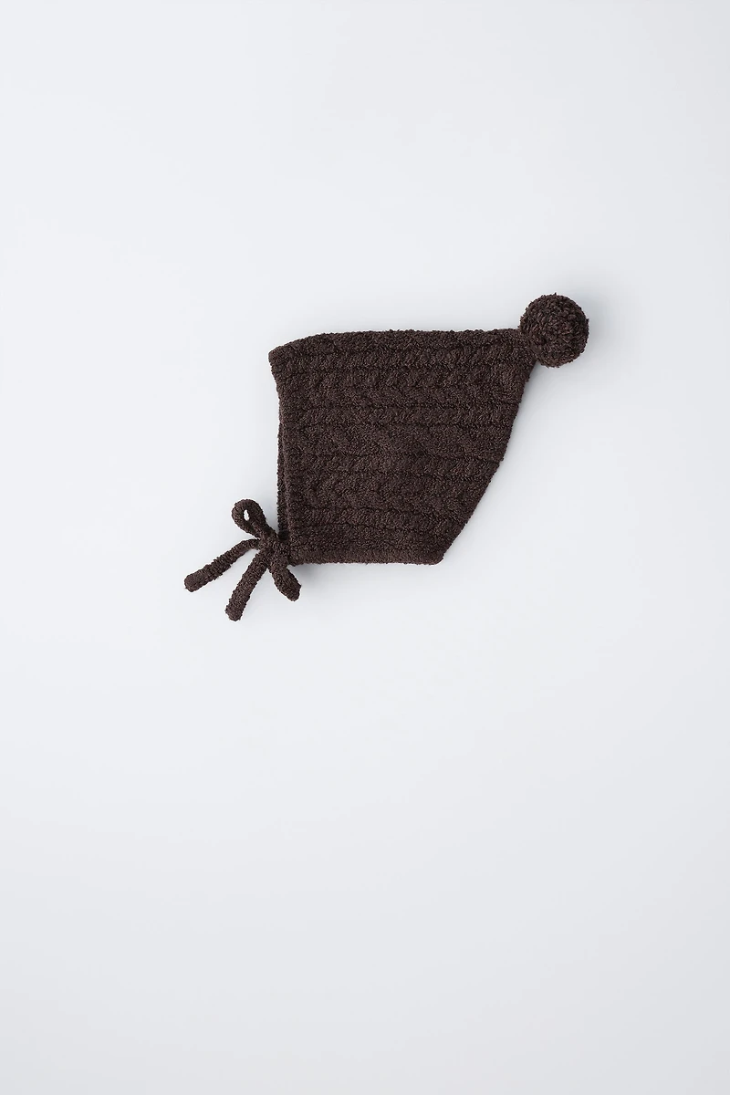 CABLE KNIT POMPOM BONNET