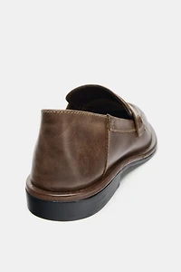 MOCASSINS EN CUIR AVEC MASQUE