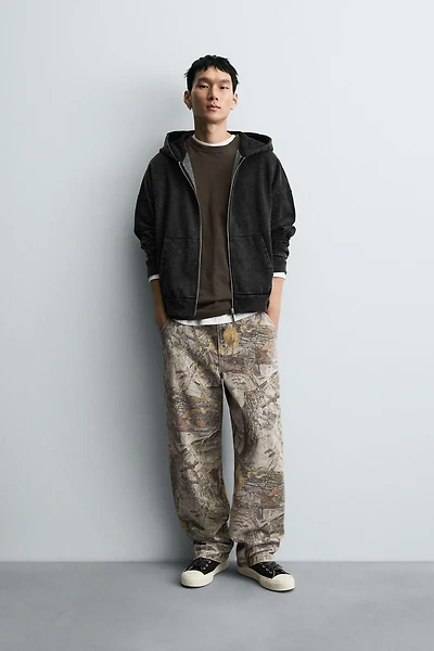 PANTALON COUVREUR IMPRIMÉ ABSTRAIT