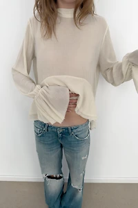 SEMI-SHEER RUFFLED TOP