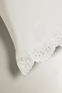 TAIE D’OREILLER BRODERIE FESTON