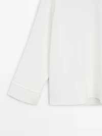 High neck blouse with hem detail