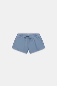 SHORT À CORDONS EFFET DÉLAVÉ