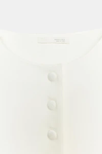 TOP GILET À BOUTONS