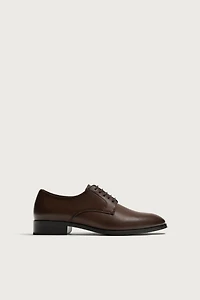 CHAUSSURES HABILLÉES