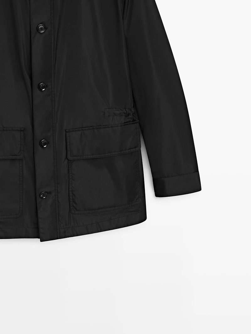 Hooded parka with fabric detail