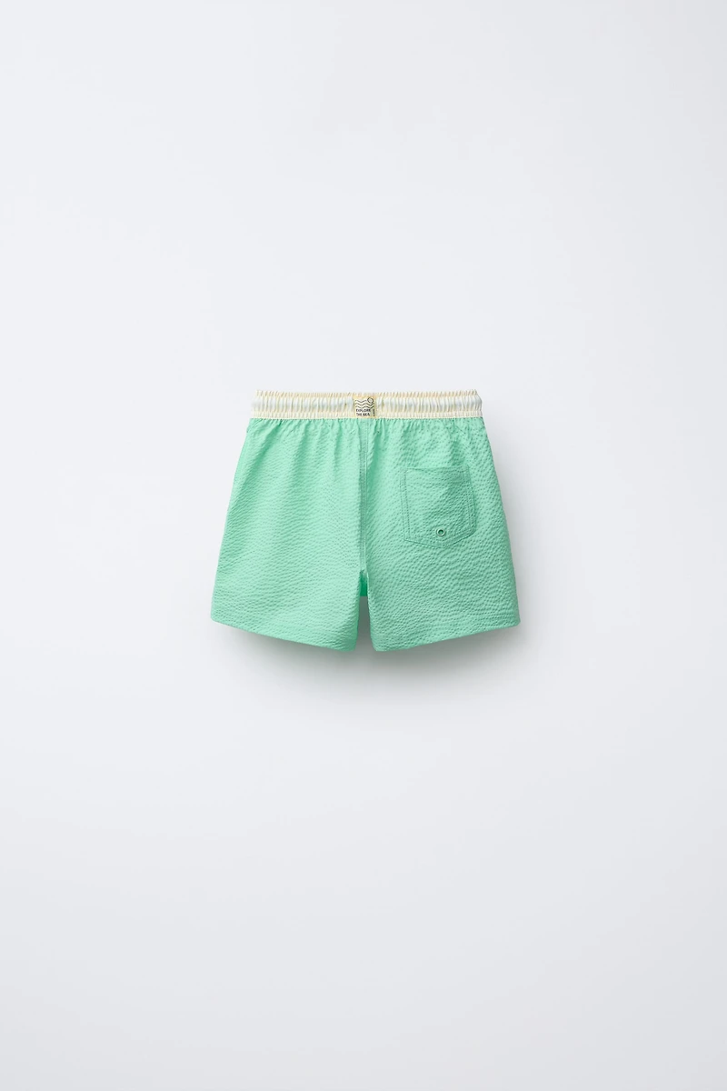 6-14 YEARS / LABEL SWIM SHORTS