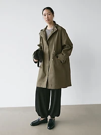 Technical fabric trench coat with hood