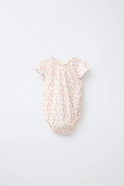 TEXTURED FLORAL BODYSUIT