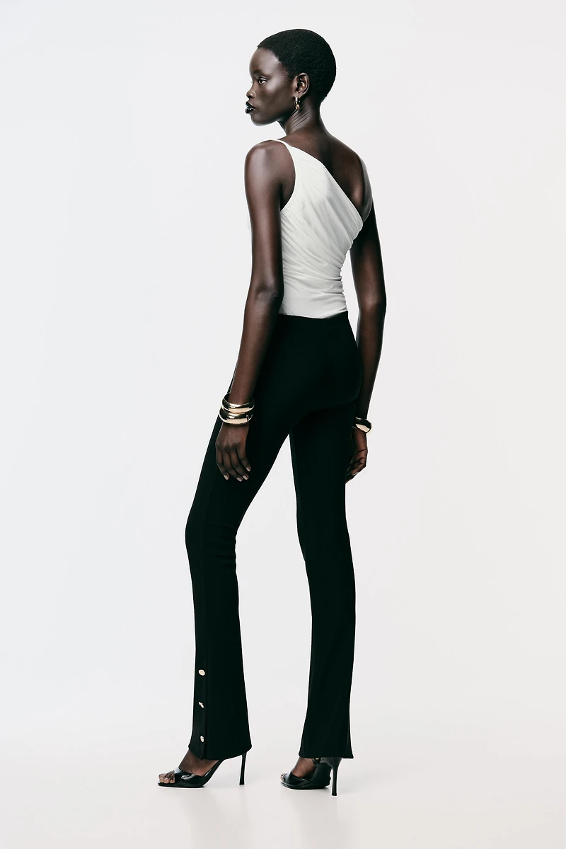 FLARE LEGGINGS WITH BOTTOM BUTTONS