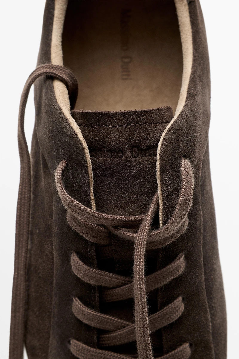 Chaussure de sport en cuir à semelle épaisse