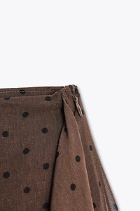 JUPE-CULOTTE À VOLANTS
