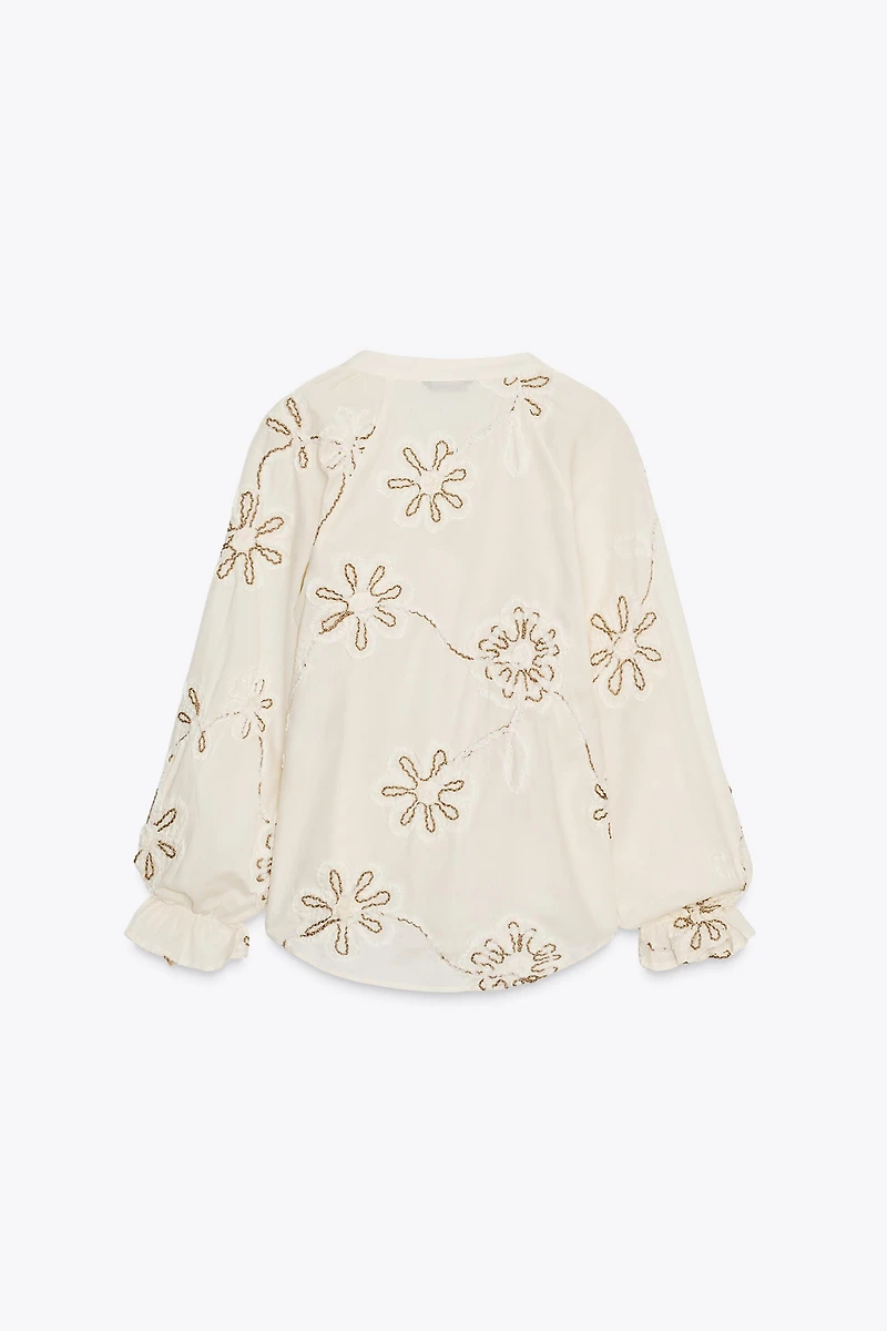 TEXTURED EMBROIDERED BLOUSE