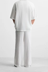 CRINKLED EFFECT PANTS