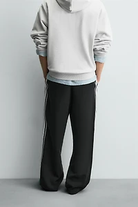 WIDE FIT JOGGER PANTS WITH SIDE STRIPES