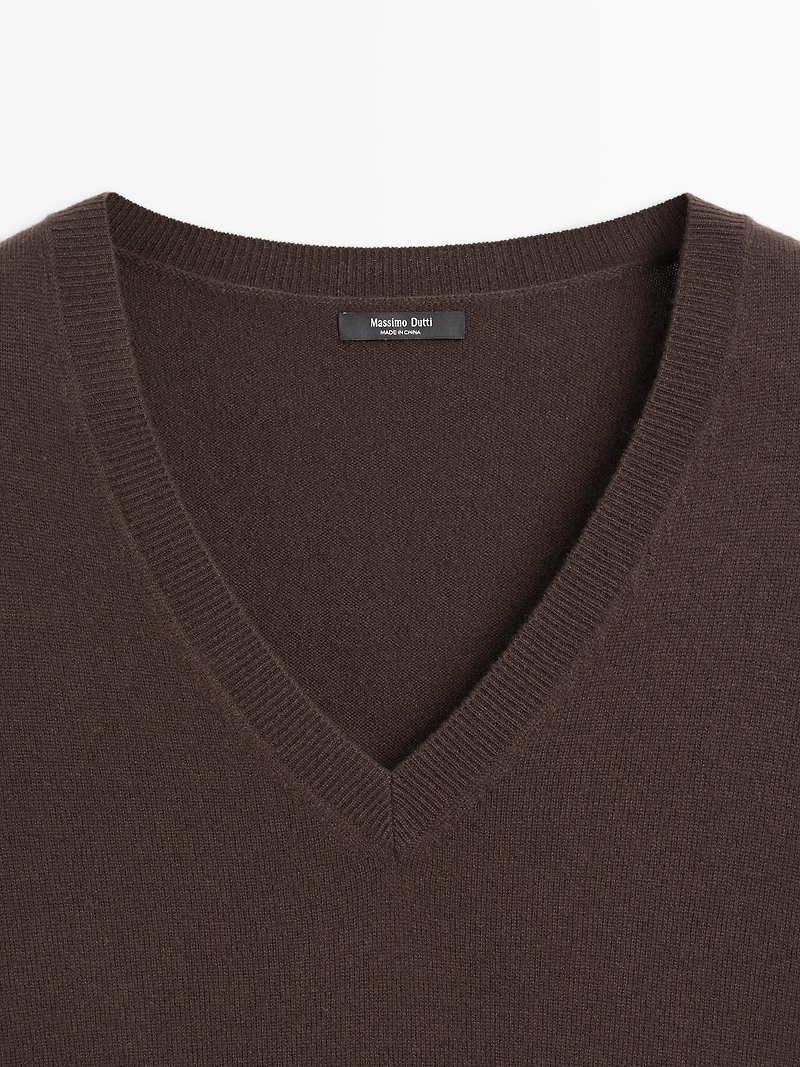 Long knit sweater with contrast lace