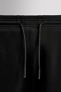 TECHNICAL ZIP PANTS