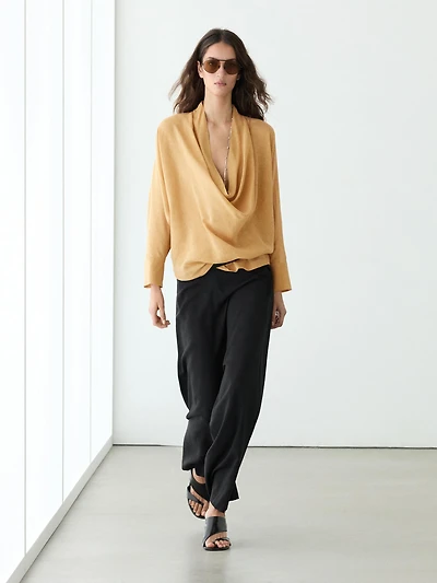 Flowing blouse with draped neckline