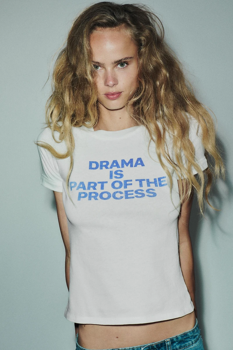 COTTON T-SHIRT WITH TEXT AND RIPS