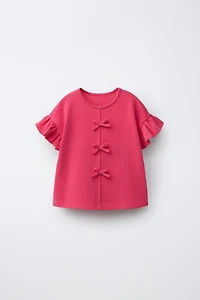 BOW AND RUFFLE T-SHIRT