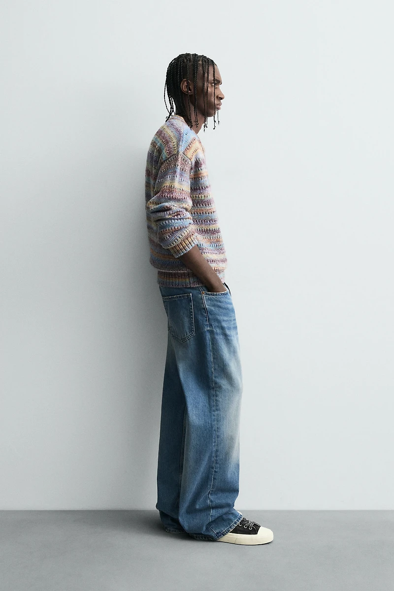 STRIPED OPEN-KNIT SWEATER