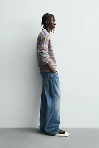 STRIPED OPEN-KNIT SWEATER