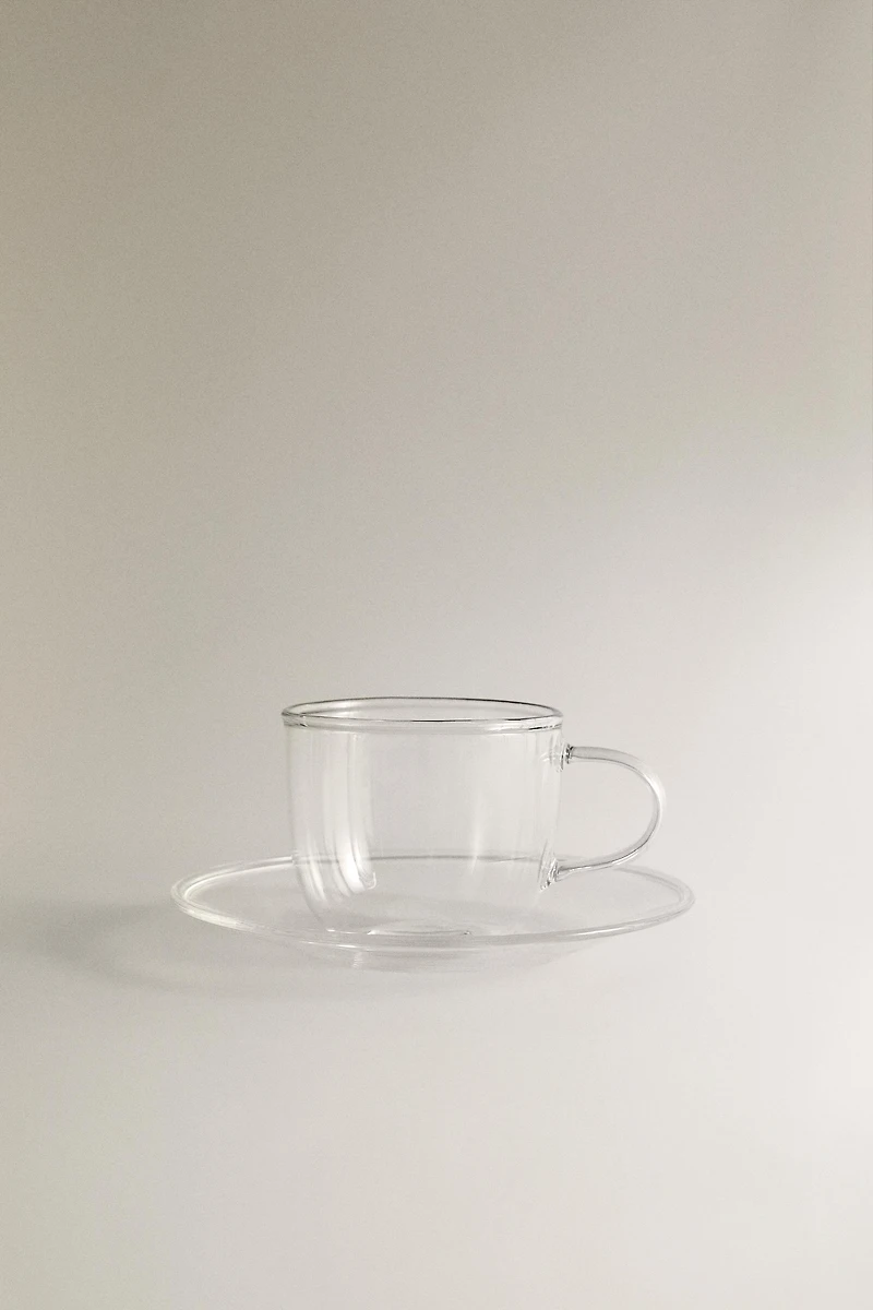 BOROSILICATE GLASS TEA CUP AND SAUCER WITH SILVER RIM