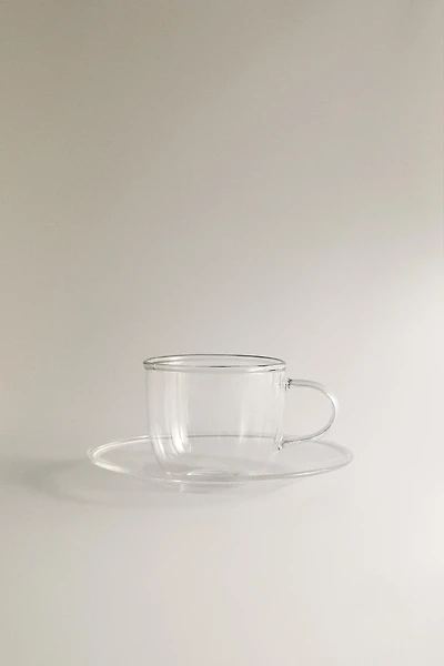 BOROSILICATE GLASS TEA CUP AND SAUCER WITH SILVER RIM