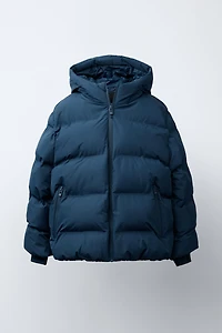 MANTEAU REMBOURRÉ ÉTIQUETTE DÉPERLANT