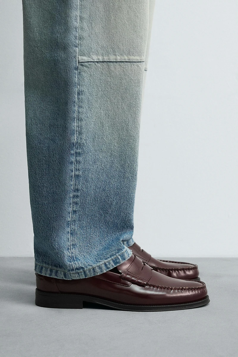 MOCASSINS EN CUIR AVEC MASQUE