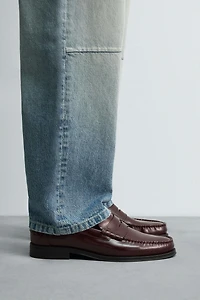 MOCASSINS EN CUIR AVEC MASQUE