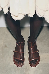STRAPPY BUCKLE SANDALS
