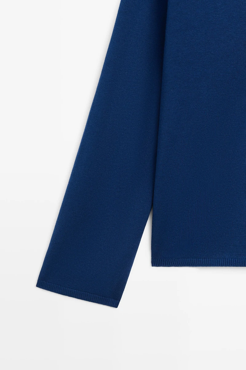 Pull rayé en maille col V